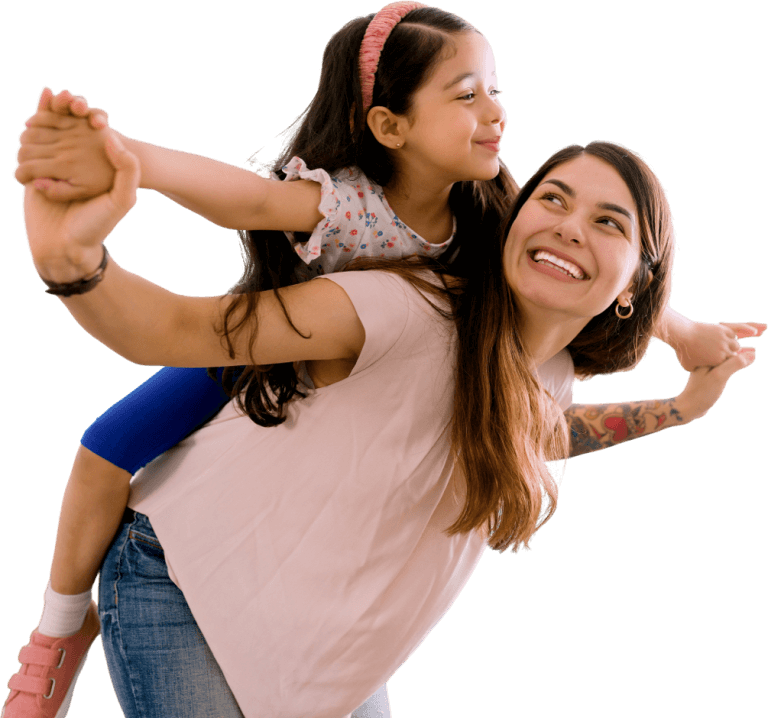 Woman with child on her back, both have their arms stretched out as if flying – holding hands. They are smiling at one another.