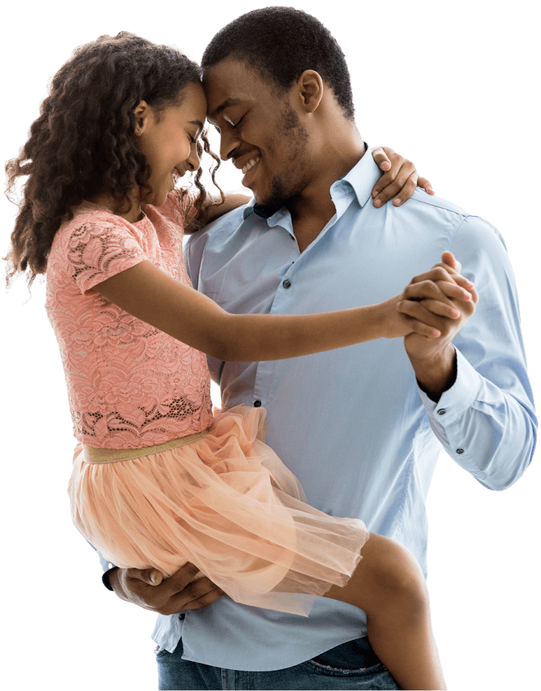 Father holding and dancing with daughter. Holding hands, heads together, eyes closed, smiling.
